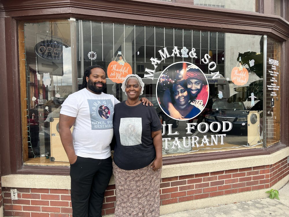 Dominique Isom (right) and Connie Nixon (left) pose for a portrait outside of their soul food restaurant called "Mama and Son Soul Food." Jacy Bradley, DN