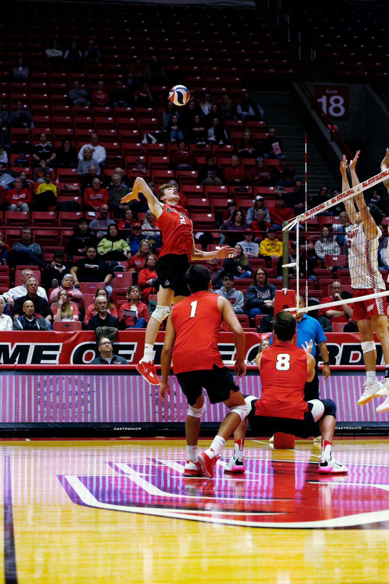 Graduate student outside attacker Kaleb Jenness spikes the ball against Sacred Heart University on Jan. 28 at Worthen Arena. Jenness scored 16 points in the game. Mya Cataline, DN