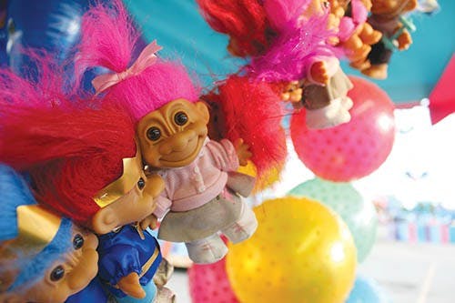 A line of assorted game prizes lines the duck pond game at the Muncie Carnival. The carnival will remain in Muncie until June 15. DN KRYSTAL BYERS