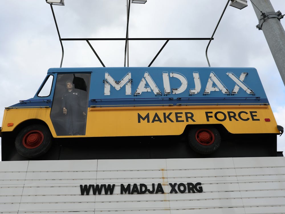 The Madjax sign sits on the corner of South Madison and East Jackson streets. Madjax Maker Force was originally called Gearbox Muncie: A Maker Hub, but the name changed in 2016 to better reflect the mission of the space. Rylan Capper, DN 