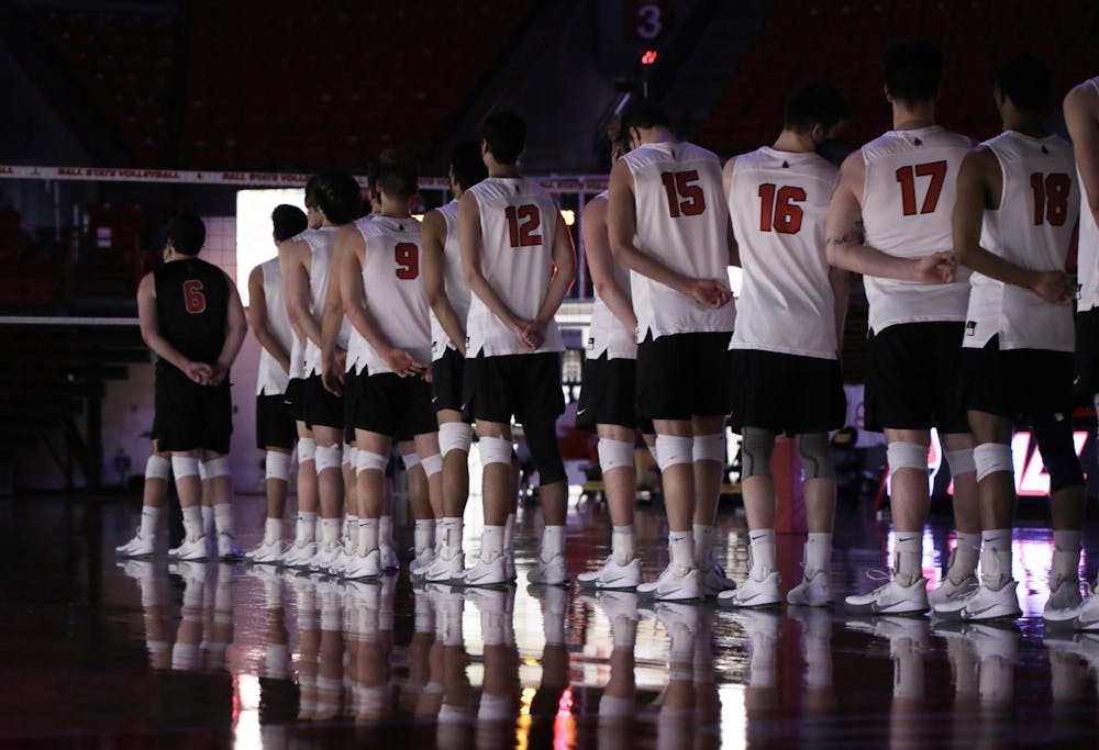 The Ball State men’s volleyball team stand for the national anthem before a game against Ohio State Feb 27, 2021, in John E. Worthen Arena. The Cardinals lost 3-2 to the Buckeyes. Rylan Capper, DN