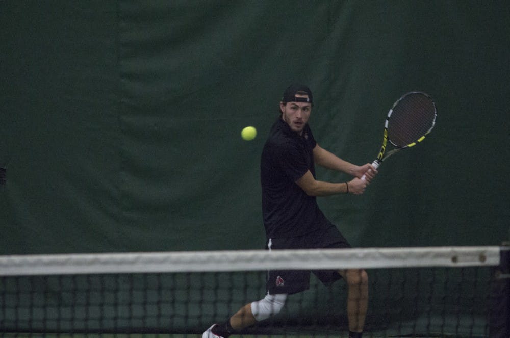 Ball State men’s tennis player Conner Andersen goes to return the ball during the doubles set against Eastern Illinois University on Jan. 20 at the Northwest YMCA of Muncie. Andersen and his partner won the set 6-2. Briana Hale, DN