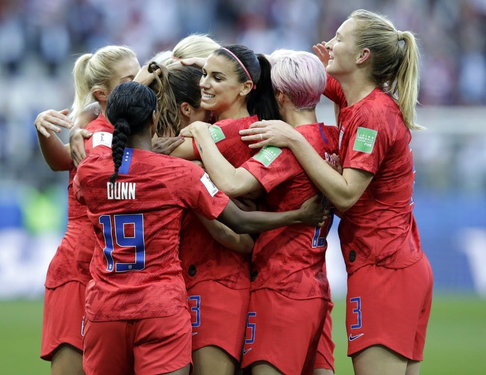 <p>United States' Alex Morgan, center, celebrates after scoring the opening goal during the Women's World Cup Group F soccer match between United States and Thailand at the Stade Auguste-Delaune in Reims, France, Tuesday, June 11, 2019. <strong>(AP Photo/Alessandra Tarantino)</strong></p>