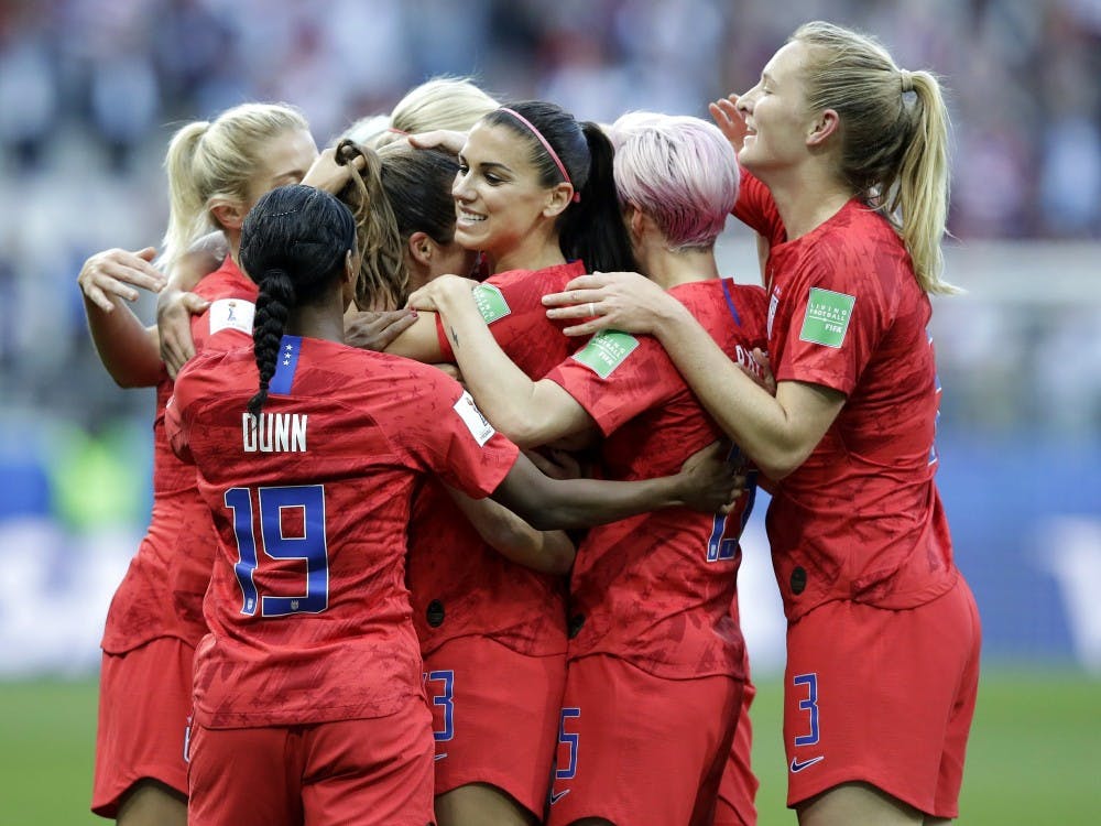 United States' Alex Morgan, center, celebrates after scoring the opening goal during the Women's World Cup Group F soccer match between United States and Thailand at the Stade Auguste-Delaune in Reims, France, Tuesday, June 11, 2019. (AP Photo/Alessandra Tarantino)