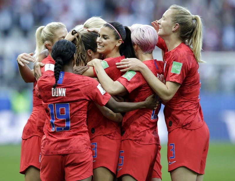 United States' Alex Morgan, center, celebrates after scoring the opening goal during the Women's World Cup Group F soccer match between United States and Thailand at the Stade Auguste-Delaune in Reims, France, Tuesday, June 11, 2019. (AP Photo/Alessandra Tarantino)