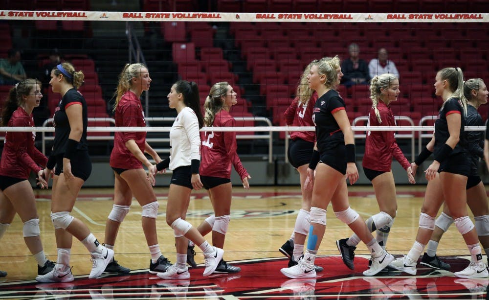 <p>The IU Women's Volleyball team shakes hands with the Ball State Women's Volleyball team Saturday, Sept. 8, 2018, at Worthen Arena. IU won three sets to two. Jacob Haberstroh,DN.</p>