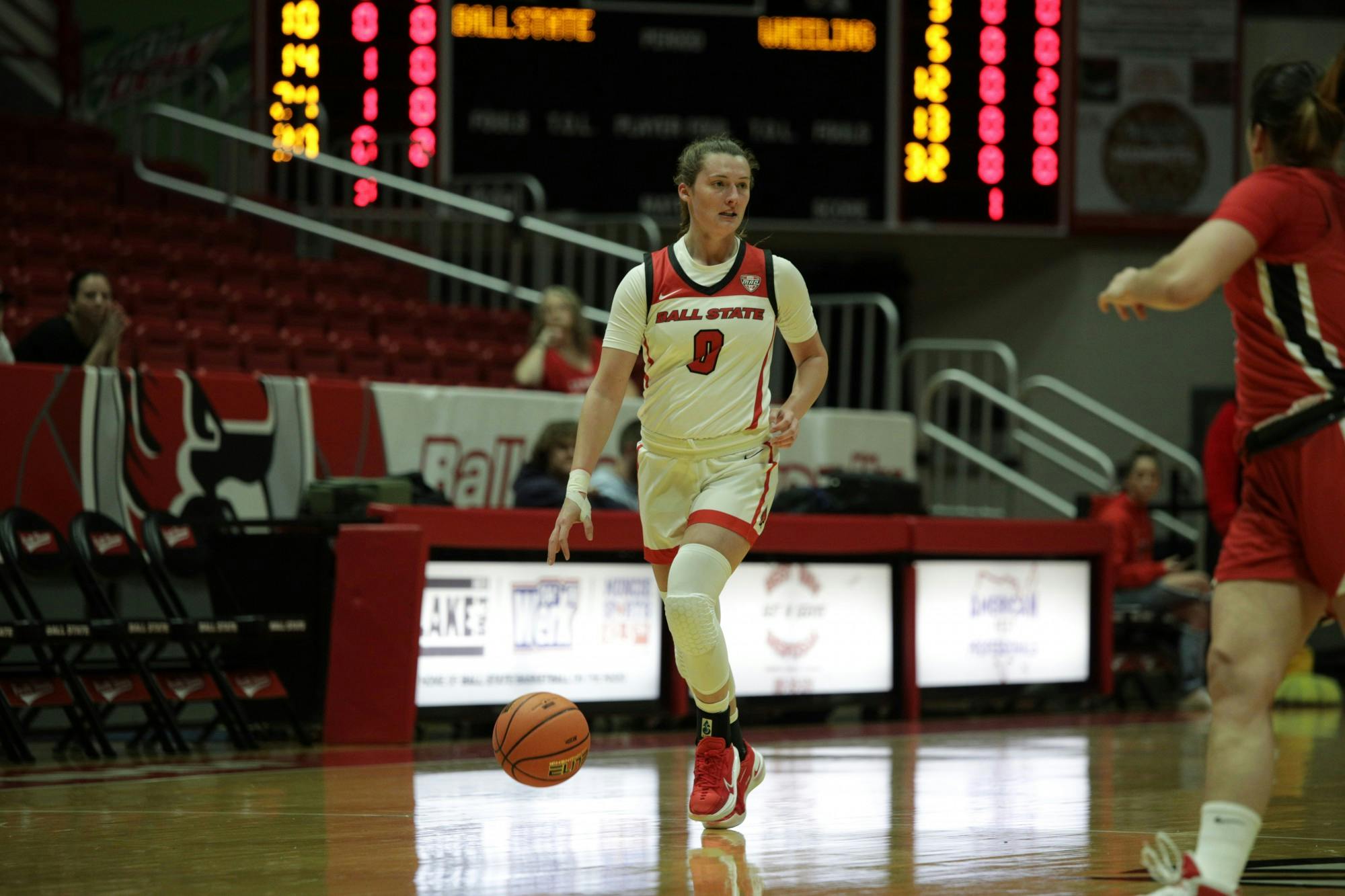 Sophomore guard Ally Becki brings the ball up the court in the game against Wheeling Nov. 1 at Worthen Arena. Brayden Goins, DN