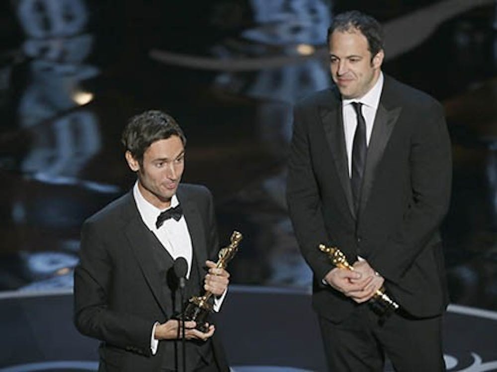 Malik Bendjelloul and Simon Chinn talk with the audience during the show at the 85th annual Academy Awards at the Dolby Theatre at Hollywood & Highland Center in Los Angeles, Calif., Feb. 24, 2013. MCT PHOTO