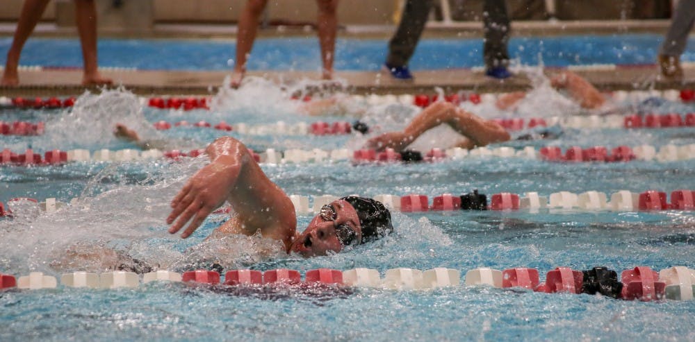 <p>Senior Morgan Brebberman competes in the 200-yard freestyle during the meet against Buffalo Jan. 27 in Lewellen Pool. <strong>Kaiti Sullivan, DN File</strong></p>