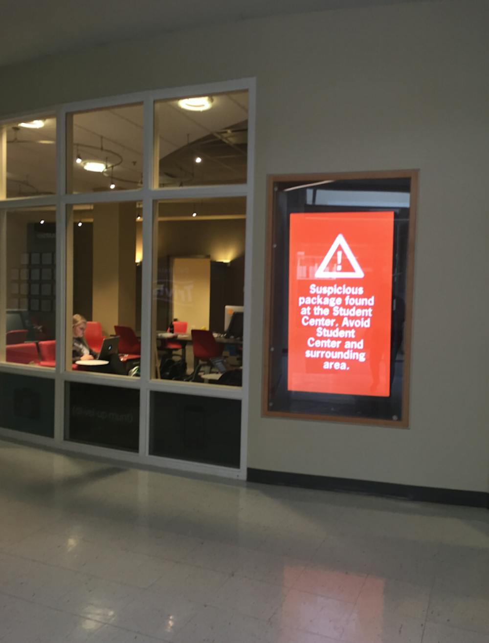 <p>Ball State sends out text messages, emails and tweets when there is an emergency on campus. Another way Ball State is working to alert students is by putting a notification on television screens throughout campus. Shown above is when they put an emergency notification on a television screen&nbsp;when there was a suspicious package left at the L.A. Pittenger Student Center on February 17. <em>DN PHOTO BREANNA DAUGHERTY</em></p>