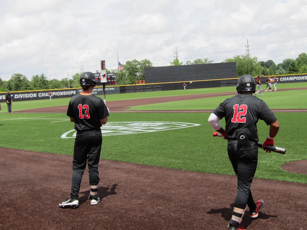Fifth-year senior center fielder Amir Wright and fifth-year senior first baseman Trenton Quartermaine take practice swings during Ball State's game against Central Michigan May 27, 2022 in Muncie, Indiana. Quartermaine made All-MAC First Team and Wright made All-MAC Second Team in 2022. (Kyle Smedley/DN)