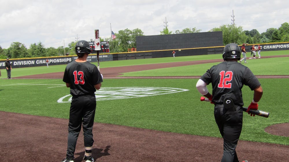 Fifth-year senior center fielder Amir Wright and fifth-year senior first baseman Trenton Quartermaine take practice swings during Ball State's game against Central Michigan May 27, 2022 in Muncie, Indiana. Quartermaine made All-MAC First Team and Wright made All-MAC Second Team in 2022. (Kyle Smedley/DN)