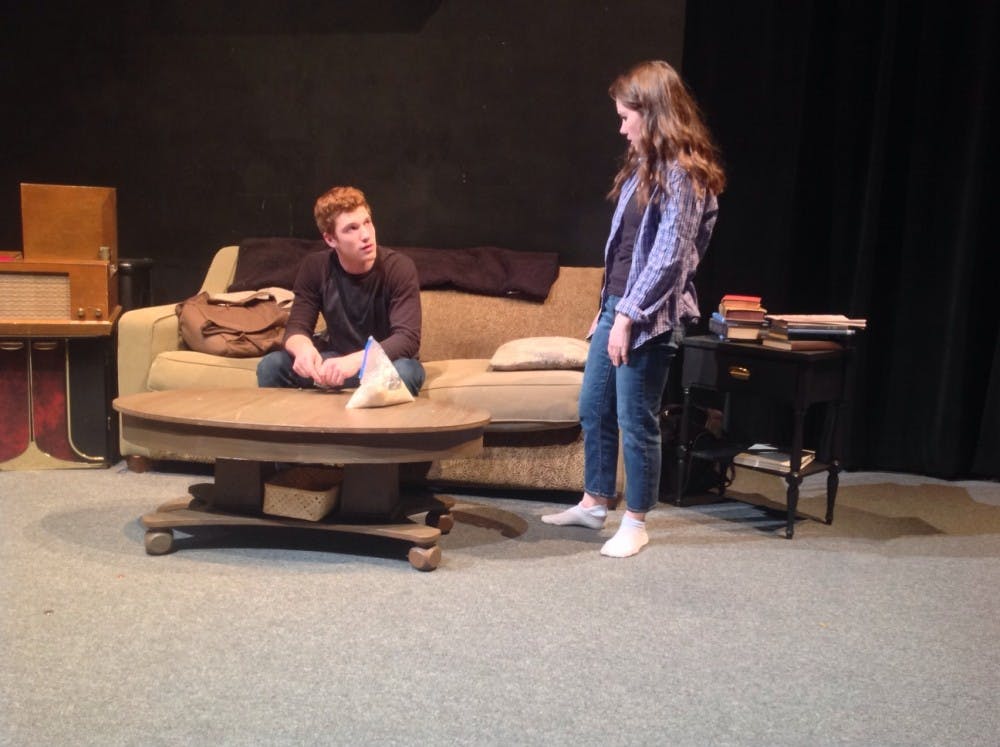 Silas Green and Courtney Martin play the roles of Charlie Weston and Leanne King in the student written and directed play, "West End Blues." Weston and King struggle with difficult pasts during the play. DN PHOTO KATHRYN HAMPSHIRE