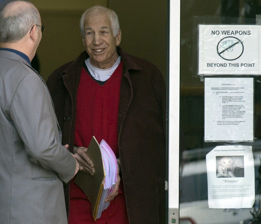 Jerry Sandusky, the man who was convicted of 45 criminal counts of sexual abuse, leaves a hearing earlier in the year. Penn State will pay out settlements to 26 young men that will total $59.7 million. MCT PHOTO
