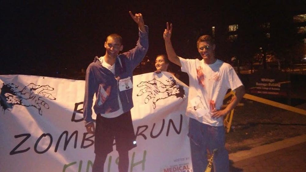 <p>Global Brigades hosted a Zombie Run to raise money for their upcoming trip to Panama. DN PHOTO RAYMOND GARCIA</p>