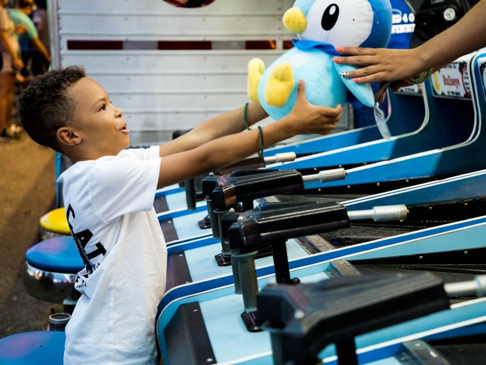 The 164th annual Delaware County Fair is running July 16-21 at the Delaware County Fairgrounds in Muncie. The week of events include a demolition derby, a rodeo, motocross races, truck and tractor pulls and the carnival. Rachel Ellis, DN 