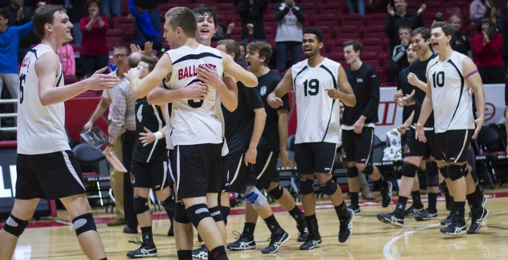 <p>The men's volleyball team celebrates after winning the game against Saint Francis 3-0 on Jan. 12 in Worthen Arena. Teri Lightning Jr., DN</p>