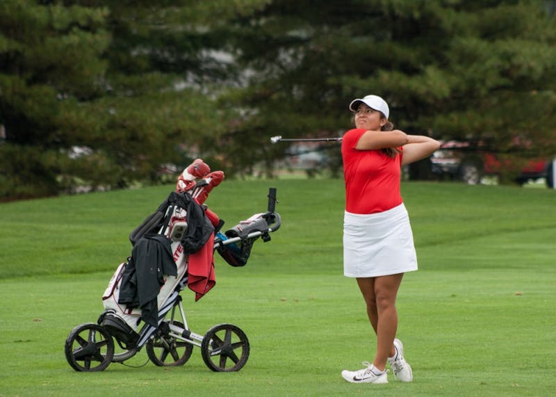 Sophomore Manon Tounalom tees off at hole 8 during the Cardinal Classic on Sept. 19. The tournament took place at the Player's Club in Yorktown. Kaiti Sullivan, DN File