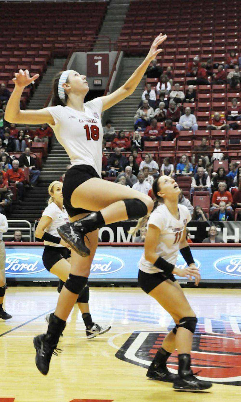 Junior opposite hitter Hayley Benson jumps to hit the ball against Central Michigan University on Nov. 1 in Worthen Arena. DN PHOTO SICONG XING