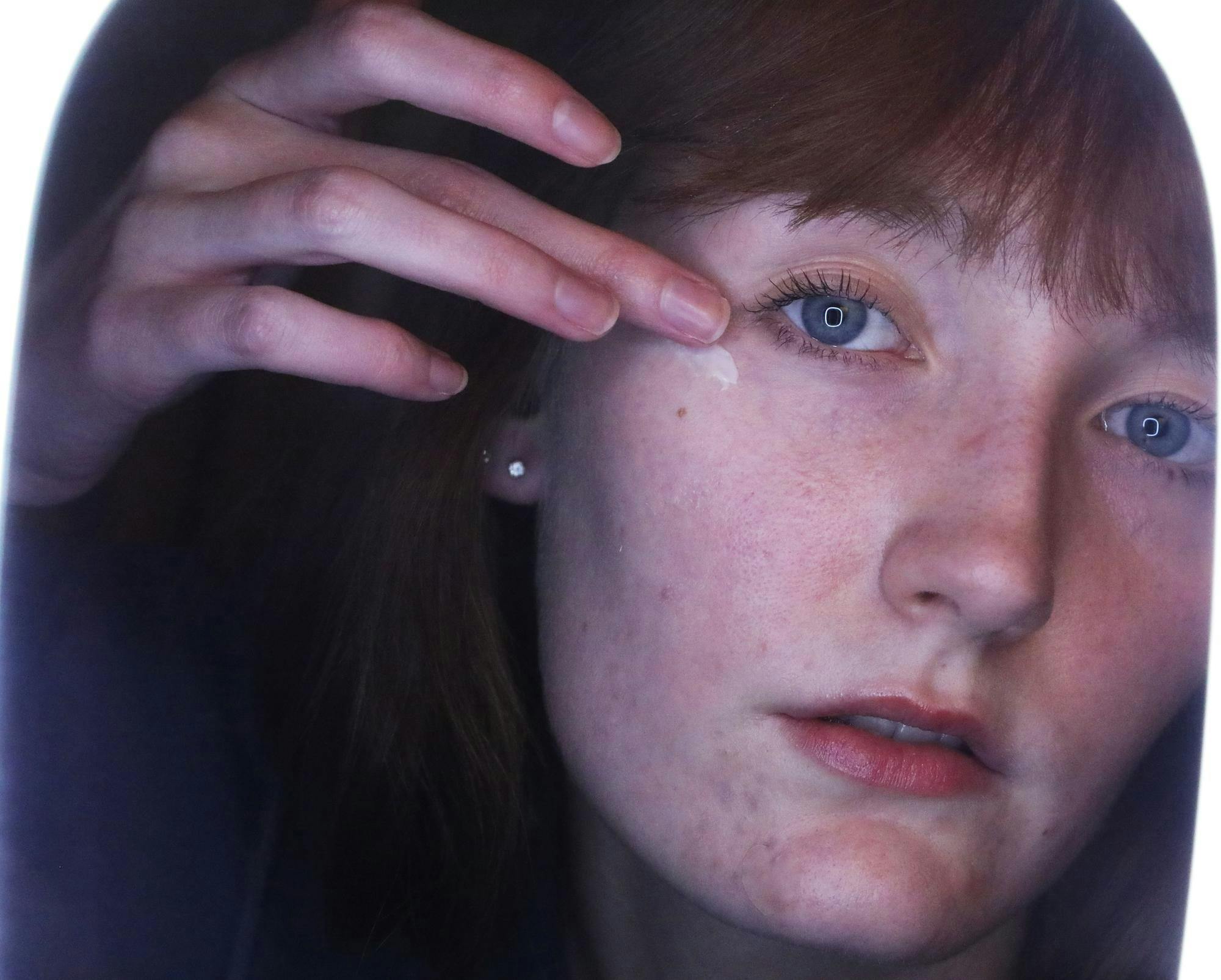 Opinion editor and second-year journalism major Kate Farr puts eye cream under her eye Nov. 27 in Muncie, Indiana. Mya Cataline, DN