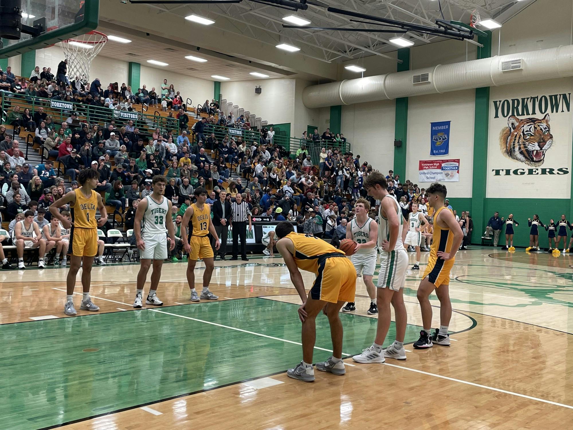 Junior guard Jacob Grim shoots a free throw Dec. 9 at Yorktown High School in Yorktown, Indiana. The Tigers defeated Delta High School 49-39. Zach Carter DN