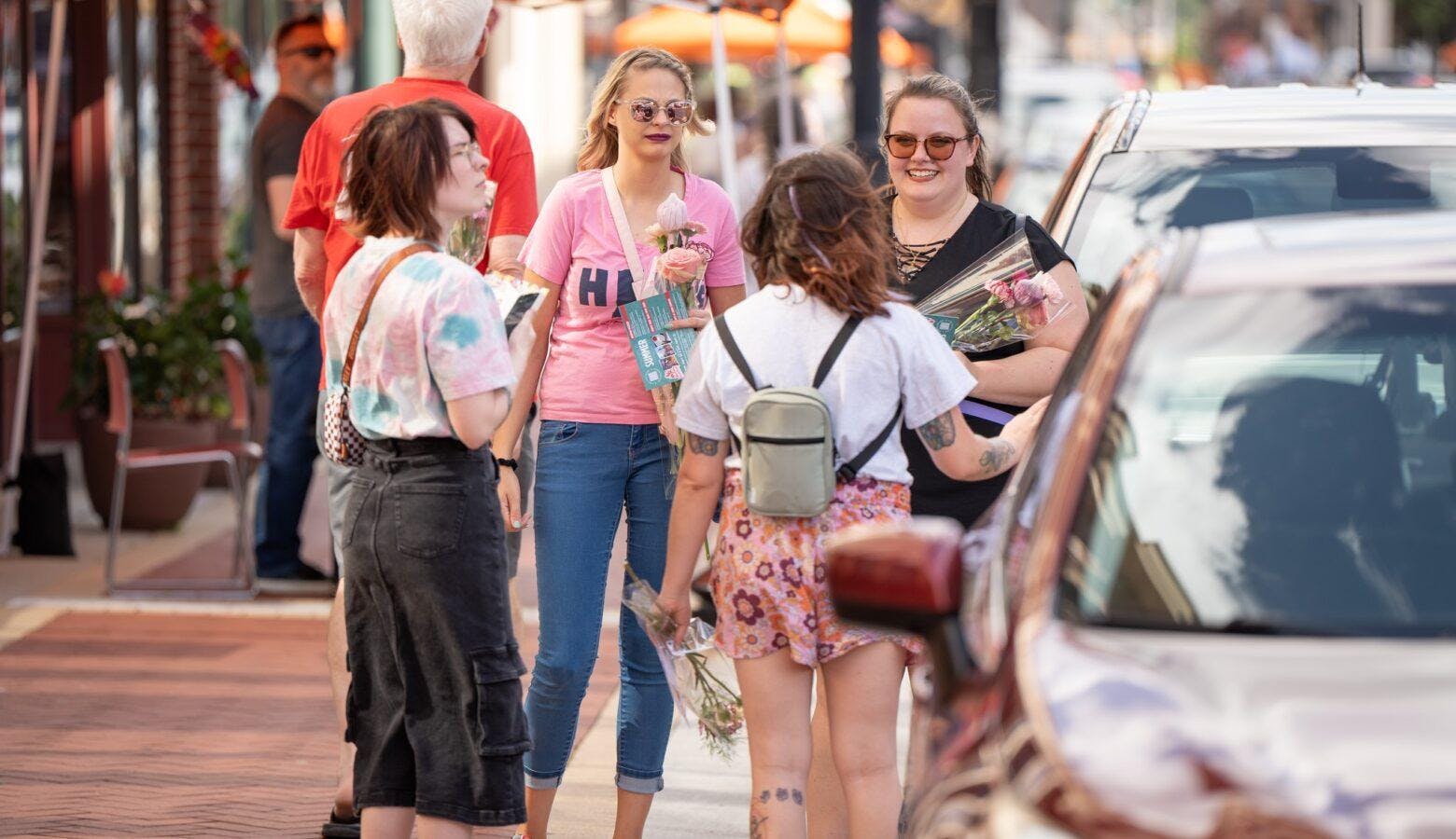 The plan allows downtown bar patrons to carry approved open alcohol containers from bar to bar.