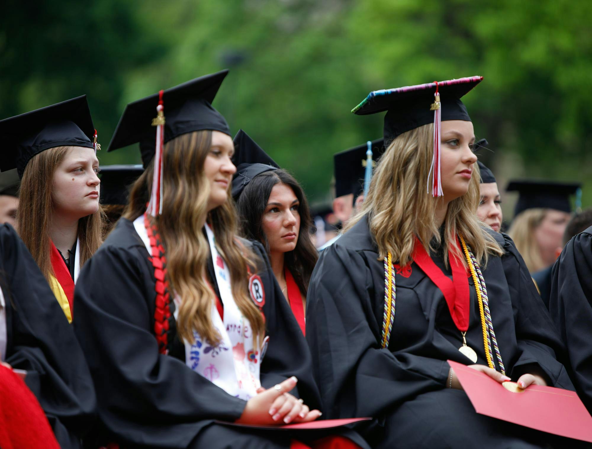Ball State seniors watch commencement ceremonies May 4 at The Quad. This first ceremony was to recognize the whole of the school and began at 10 a.m. Andrew Berger, DN
