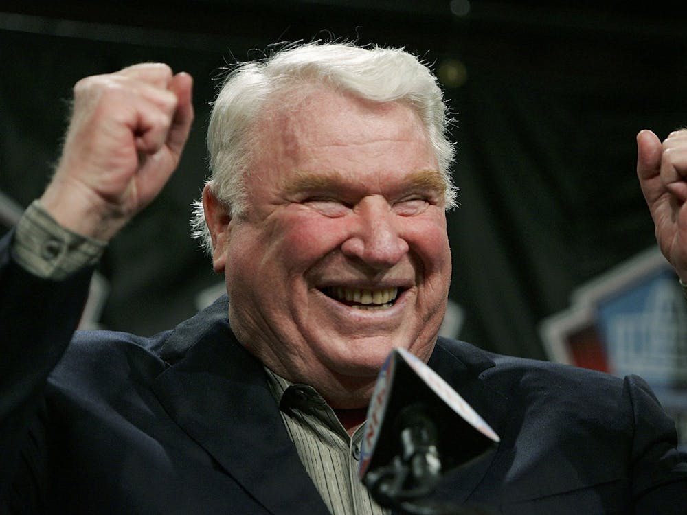 Broadcaster and former coach John Madden celebrates his selection to the NFL Hall of Fame during a press conference Feb. 4, 2006, at the Renaissance Center in Detroit, Michigan. (Jonathan Daniel/Getty Images/TNS)