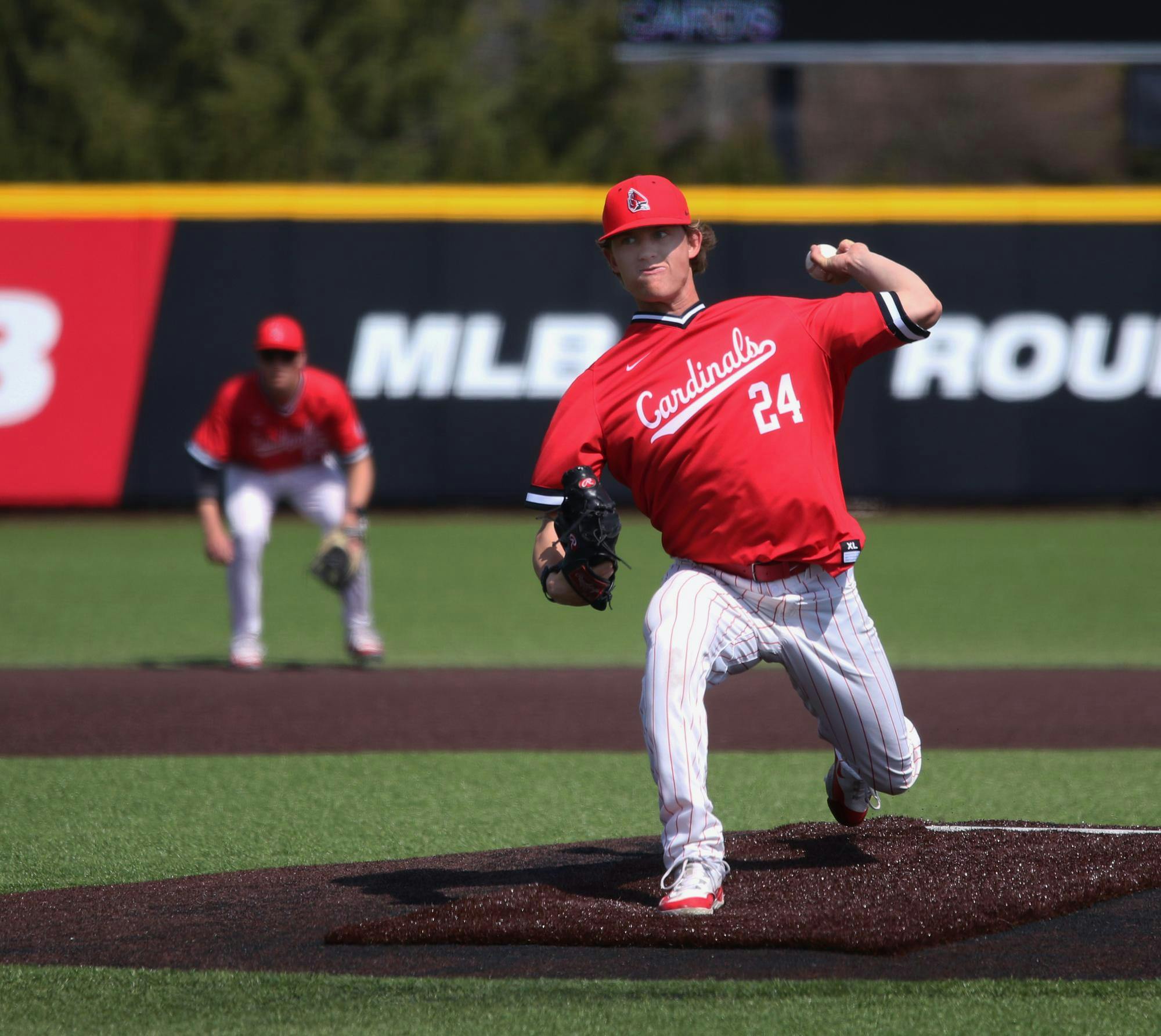 Freshman pitcher Keegan Johnson throws the ball against Ohio Univeristy March 30 at First Merchants Ball Park Complex. Johnson allowed one run during the game. Meghan Sawitzke, DN