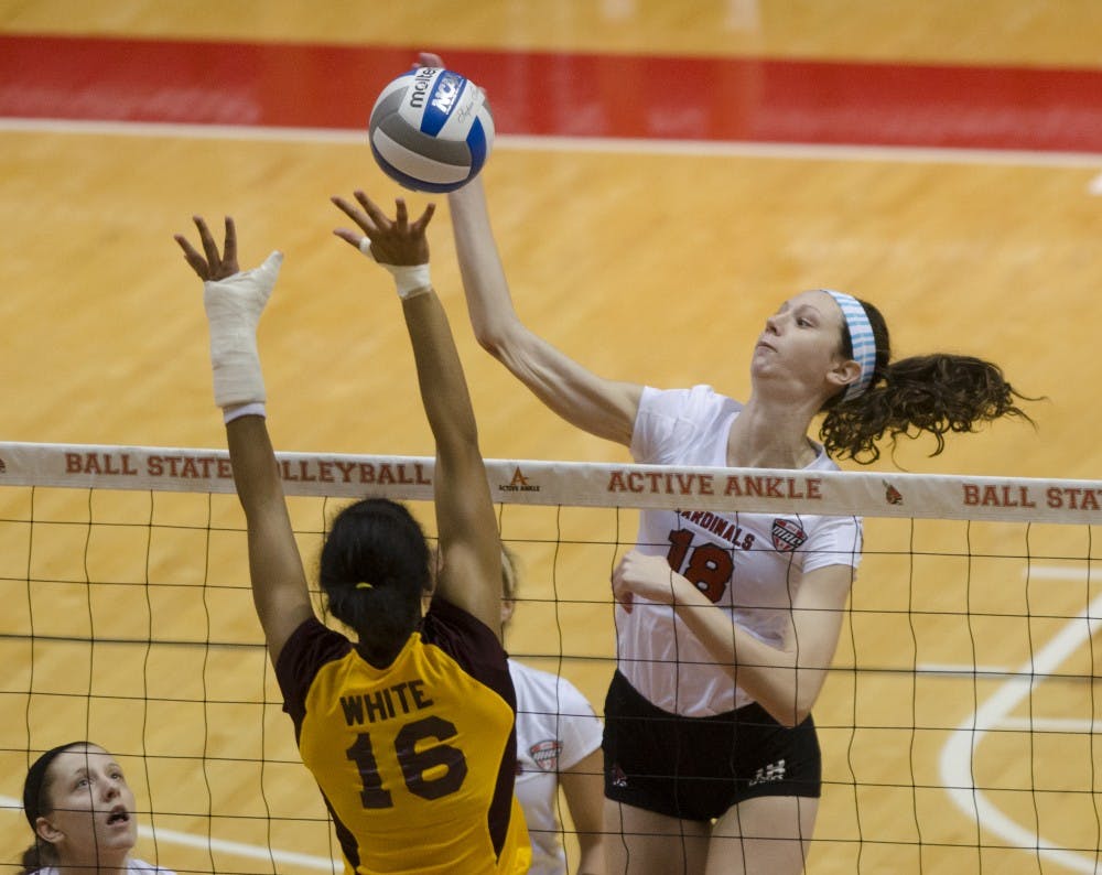 Sophomore middle blocker Hayley Benson hits the ball against Central Michigan University on Nov. 1 at Worthen Arena. The sophomore has gained 26 kills in the last two losing matches against the University of Toledo and the University of Akron and was tied second on the team against Akron. DN FILE PHOTO BREANNA DAUGHERTY