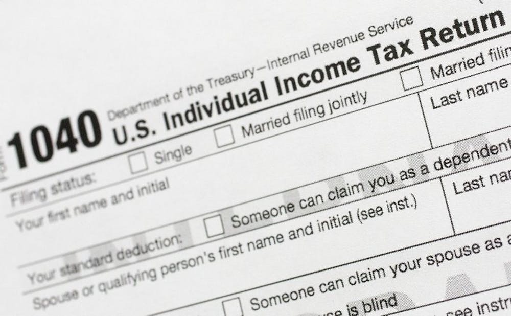<p>This July 24, 2018, file photo shows a portion of the 1040 U.S. Individual Income Tax Return form. The IRS began accepting and processing tax returns for individuals on Monday, Jan. 27, 2020. <strong>(AP Photo/Mark Lennihan, File)</strong></p>