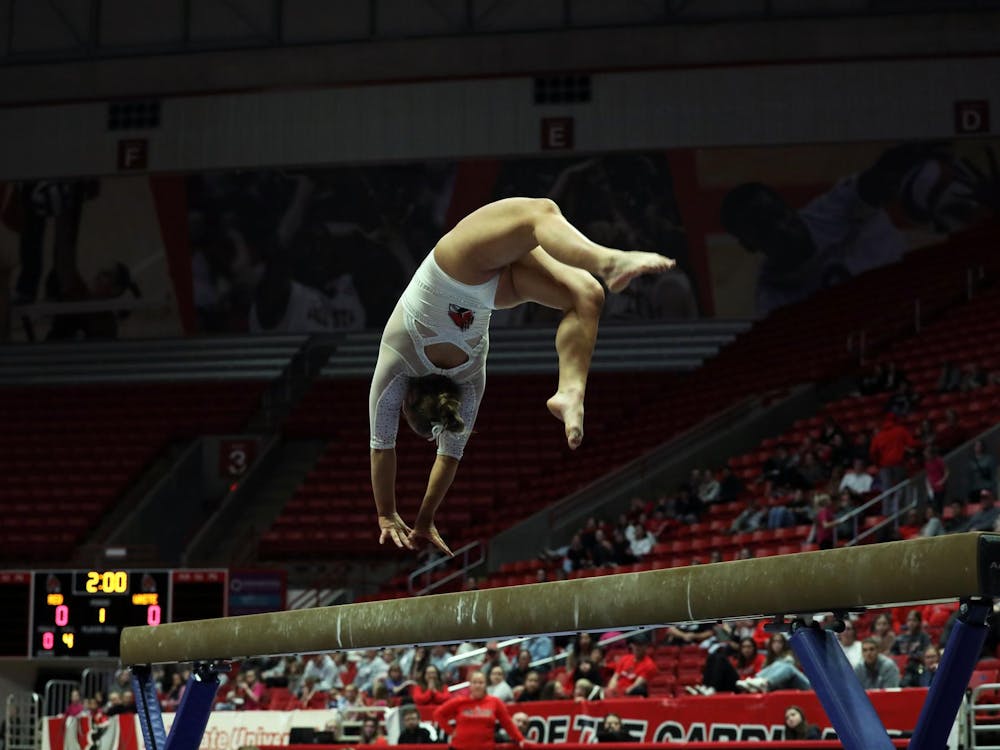 Freshman Lindsay Fuller does a back hand spring during the Red vs White meet Dec. 8 at Worthen Arena. Fuller scored a 9.650 on the beam. Mya Cataline, DN