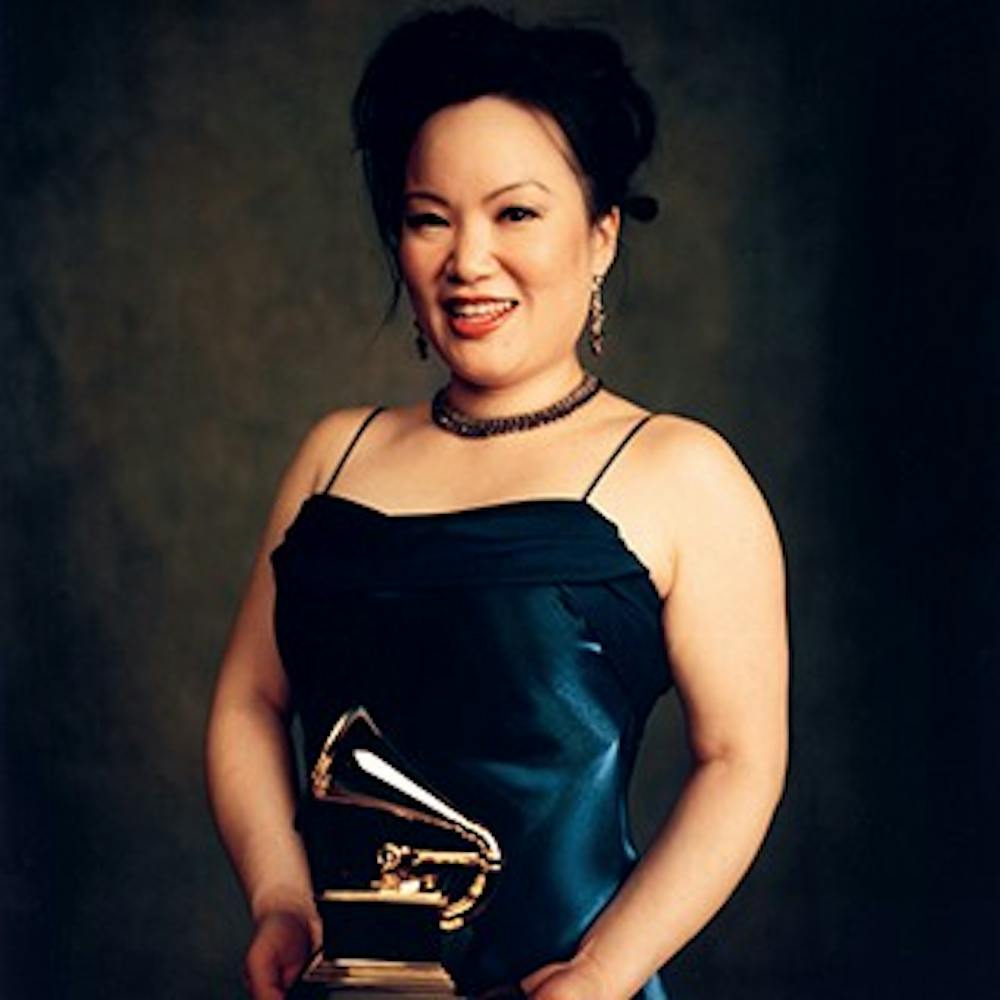 Anglelin Chang holds her 2007 Grammy Award for her recording of Oliver Messiaen's "Oiseaux Exotiques" with the Cleveland Chamber Symphony. Chang will perform at 2 p.m. Dec. 9 in Emens Auditorium. Ball State, Photo Provided.
