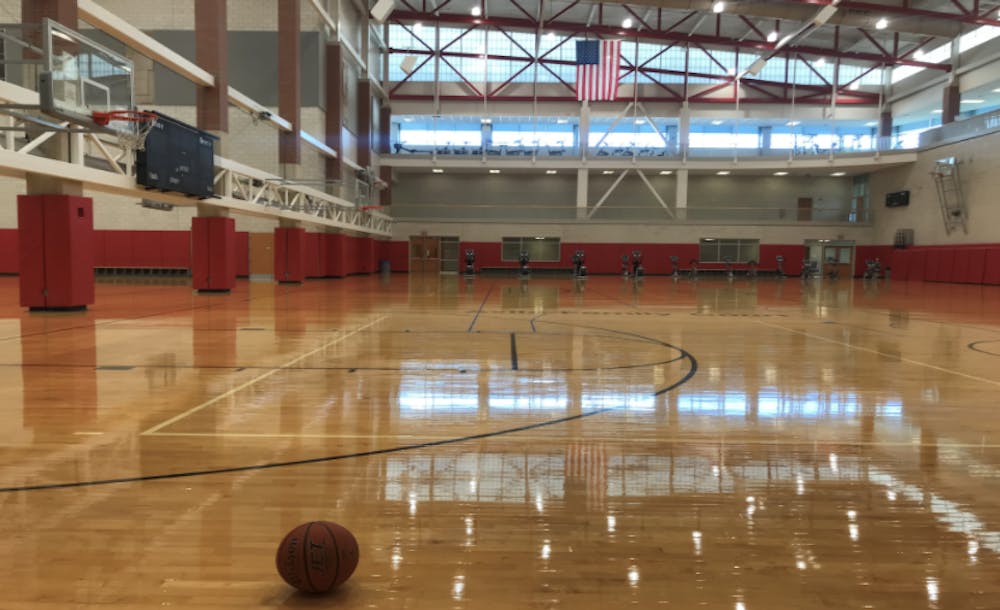 At 2 p.m. on Monday, people would typically be using the basketball courts. Now they are empty and locked because of the new hours. 