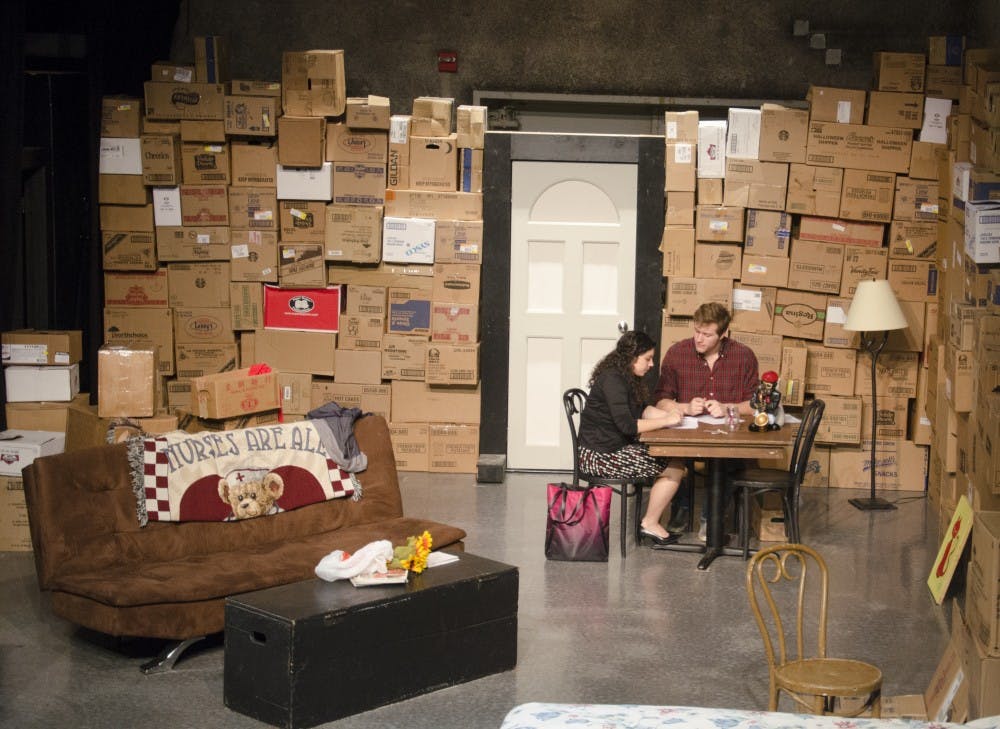 Marion, played by Meghan Baker, and Arthur, played by Jacob Barnes, prepare to sign papers to sale the apartment Arthur and his late partner died in. "On Tidy Endings" focuses on America's past and future of the gay rights movement. DN PHOTO BREANNA DAUGHERTY