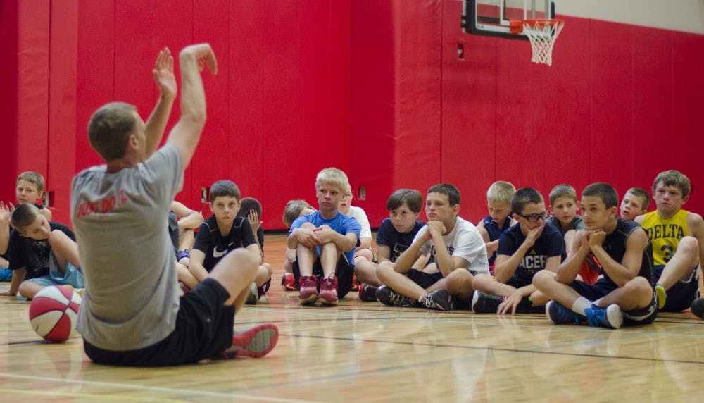 Children participated in the boys basketball camp with the Ball State men's basketball team. The camp is meant to help young players improve their skills and technique. DN PHOTO BREANNA DAUGHERTY