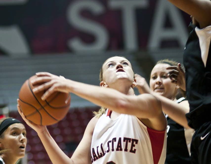 Sophomore guard Shelbie Justice attempts the lay up against Butler Tuesday evening at Worthen Arena. Ball State lost the game 62-70. Justice was responsible for 10 points during the game. DN PHOTO JONATHAN MIKSANEK