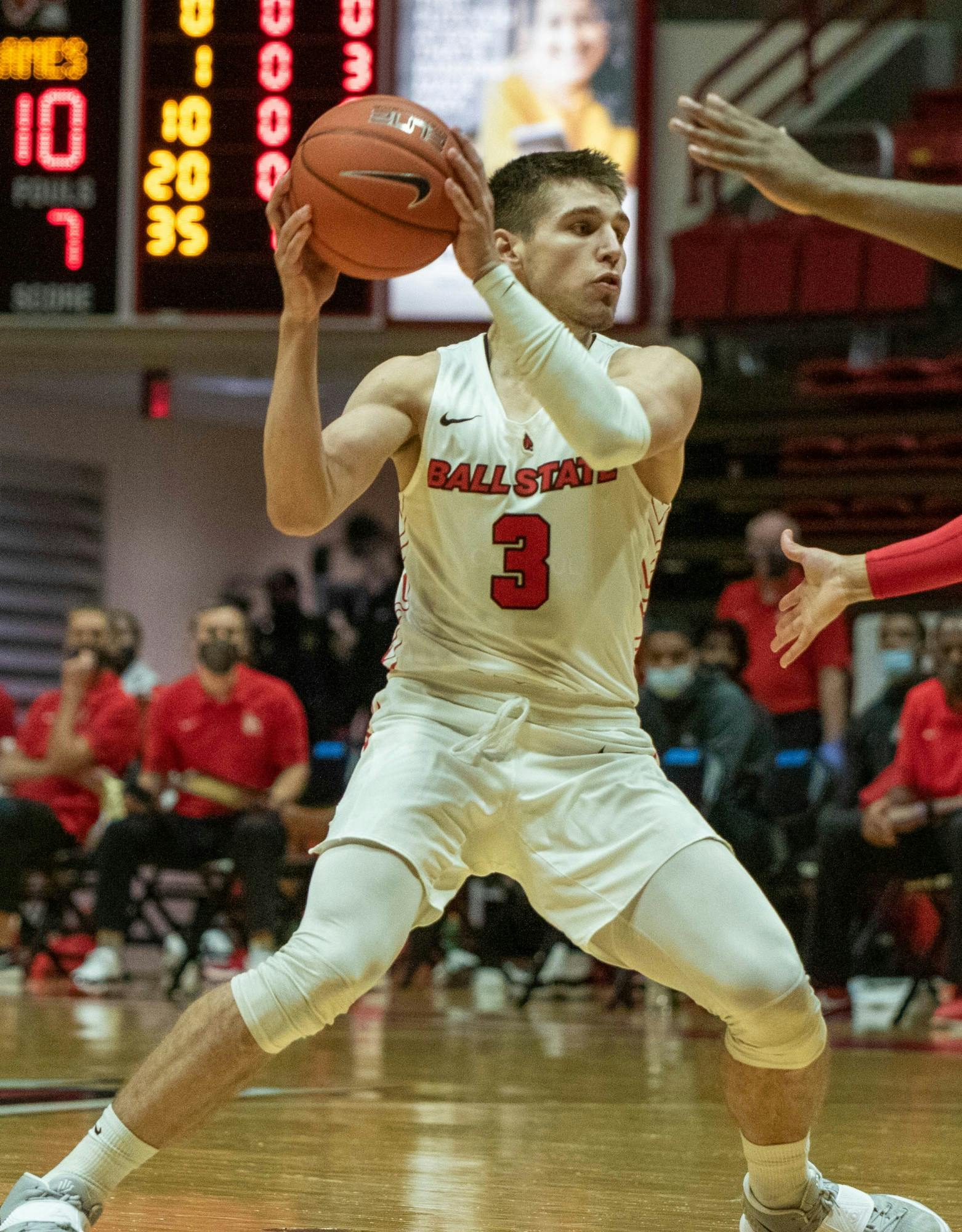 Freshman guard Teemu Suokas holds the ball  Dec. 5, 2020, in Worthen Arena. Suokas had one rebound against the Flames. Jaden Whiteman, DN