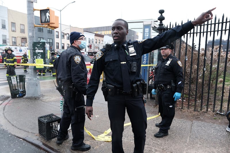 Police and emergency responders gather at the site of a reported shooting of multiple people outside of the 36 St subway station on April 12, 2022, in the Brooklyn borough of New York City. According to authorities, multiple people have reportedly been shot and several undetonated devices were discovered at the 36th Street and Fourth Avenue station in the Sunset Park neighborhood. (Spencer Platt/Getty Images/TNS)