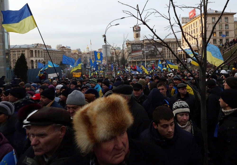 Thousands of protesters are demanding the resignation of President Viktor Yanukovych over his decision to suspend a partnership and trade agreement with the European Union, Tuesday, Dec. 3, 2013, in Kiev. Protesters called for Ukraine's parliament to sack the government. (Sergei L. Loiko/Los Angeles Times/MCT)