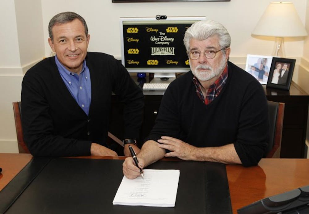 Bob Iger and George Lucas sign a contract selling George Lucas’ Lucasfilm Ltd. for $4.05 billion to the Walt Disney Co. The agreement between the companies will allow for three new Star Wars films, that Lucas will not write or direct. PHOTO COURTESY OF dallasnews.com