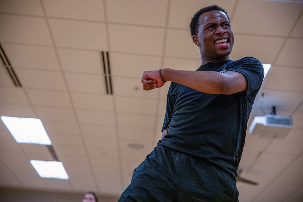 Immanuel Simon dances during his class Feb. 13, 2020, at the Jo Ann Gora Student Recreation and Wellness Center. Simon likes to move around the dance room during his class, walking in between his students. Jacob Musselman, DN