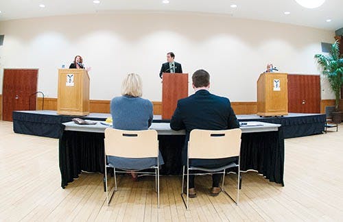 Student Government Association vice presidential candidates answer audience and Twitter questions concerning SGA policy and platform points during the debate Feb. 12, 2013 at the L.A. Pittenger Student Center Ballroom. The slates will deliver their addresses today at 3:15 p.m. DN PHOTO JONATHAN MIKSANEK