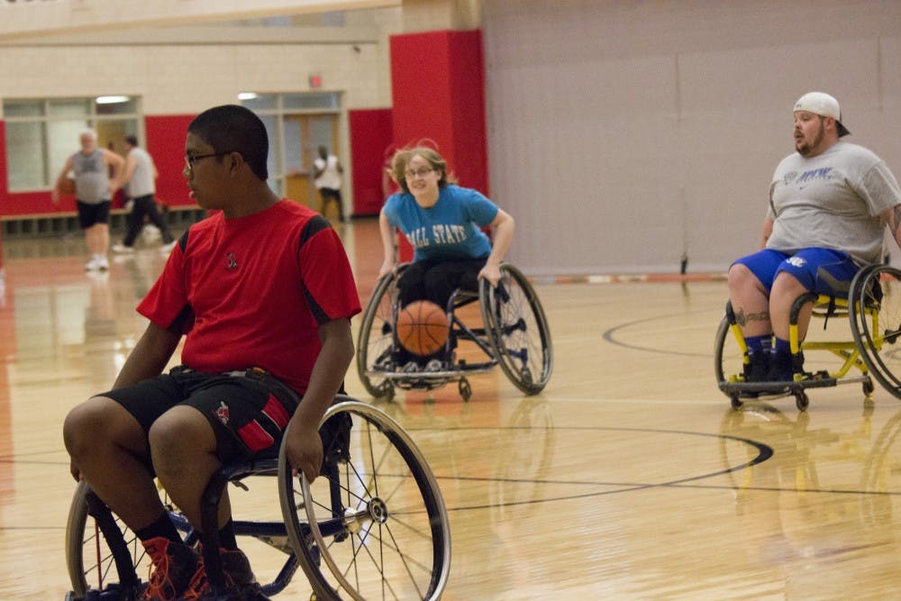 Players chase after the ball during their last game of basketball at the Student Rec Center on March 31. DN PHOTO ALISON CARROLL