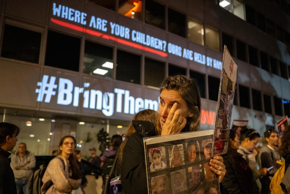 <p>The parents and relatives of children kidnapped on Oct. 7, along with families of hostages and their supporters take part in a demonstration outside the UNICEF headquarters to protest their silence to 40 children held hostage in Gaza on World’s Children Day on Nov. 20, 2023, in Tel Aviv, Israel. Alexi J. Rosenfeld, Getty Images/Tribune Content Agency</p>