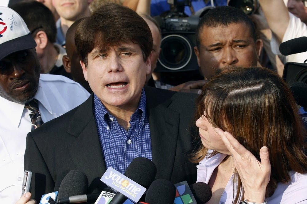 <p>In this March 14, 2012, file photo, former Illinois Gov. Rod Blagojevich speaks to the media outside his home in Chicago as his wife, Patti, wipes away tears a day before reporting to prison after his conviction on corruption charges. President Donald Trump is expected to commute the 14-year prison sentence of Blagojevich. The 63-year-old Democrat is expected to walk out of prison later Tuesday, Feb. 18, 2020. <strong>(AP Photo/M. Spencer Green, File)</strong></p>