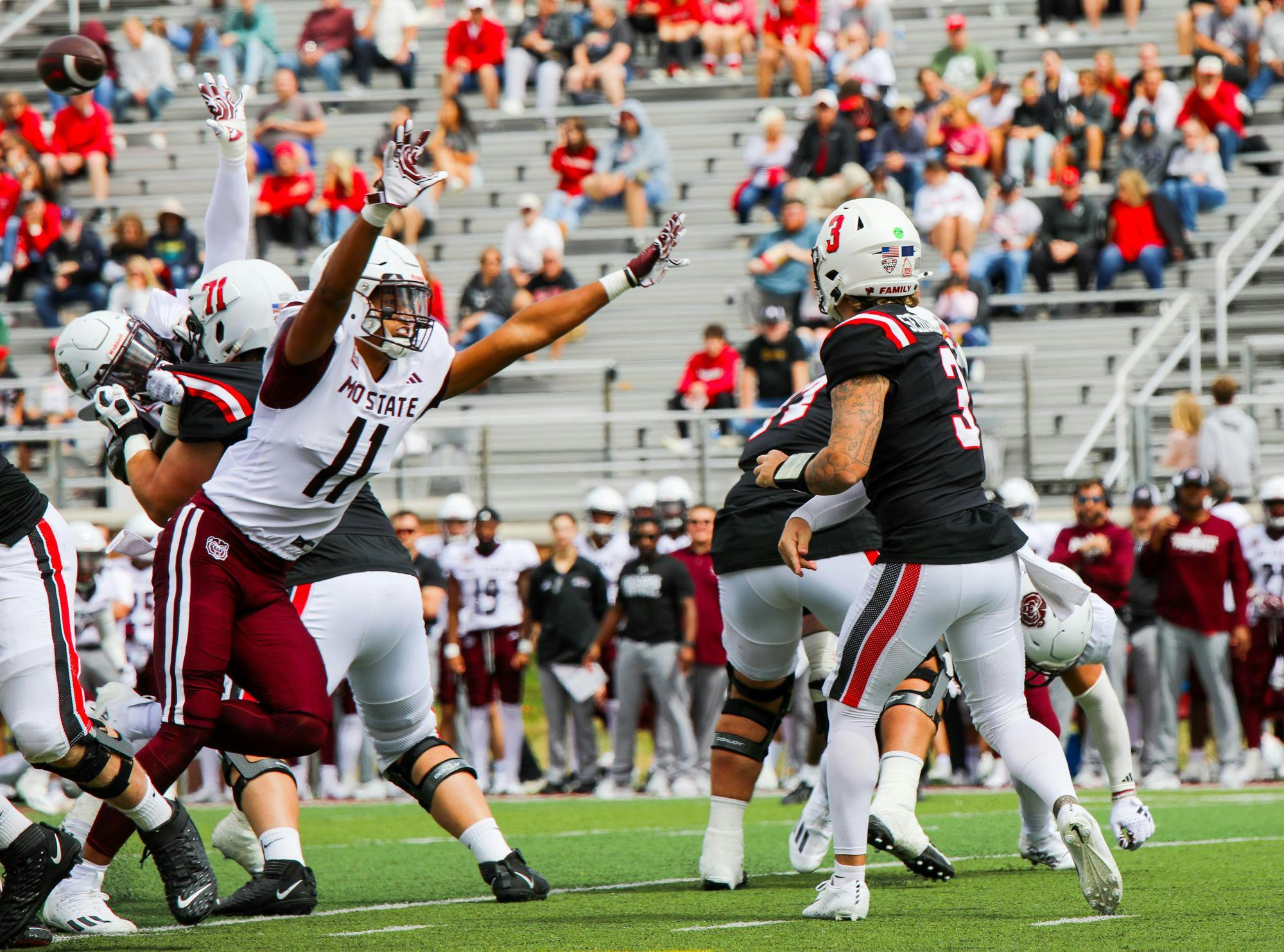 Freshman quarterback Kadin Semonza threw the ball in play against Missouri State Sept. 7 at Scheumann Stadium. Semonza played in four games last year starting three of those. Isabella Kemper, DN