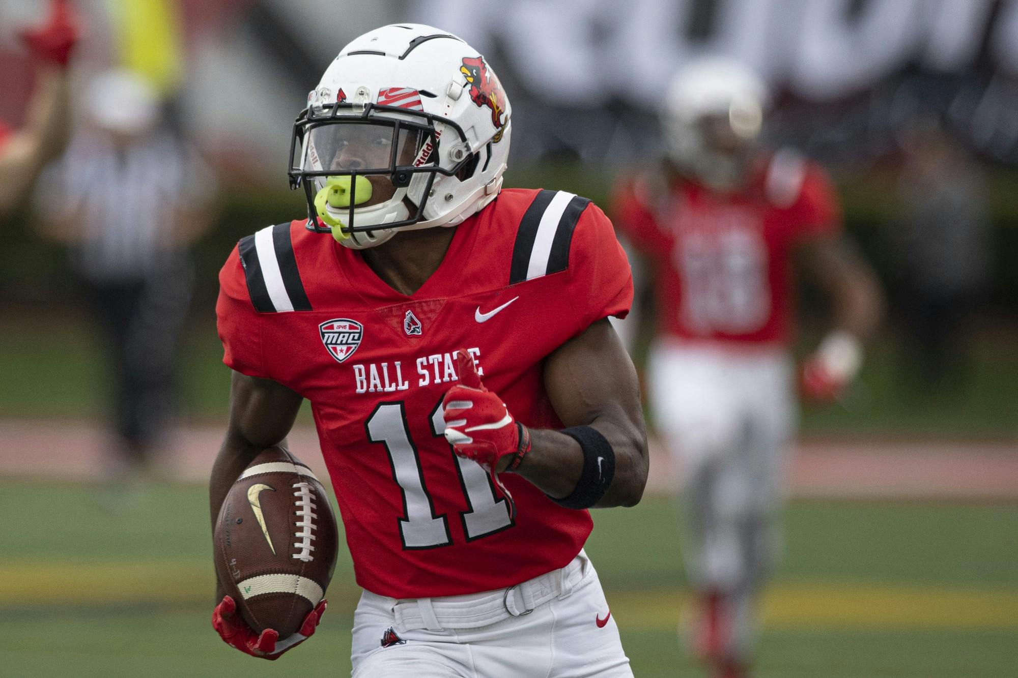 Cardinals fifth-year senior wide receiver Justin Hall runs in the open field on the opening kickoff for a touchdown Oct. 2, 2021, at Scheumann Stadium. The Cardinals beat the Black Knights 28-16. Jacob Musselman, DN