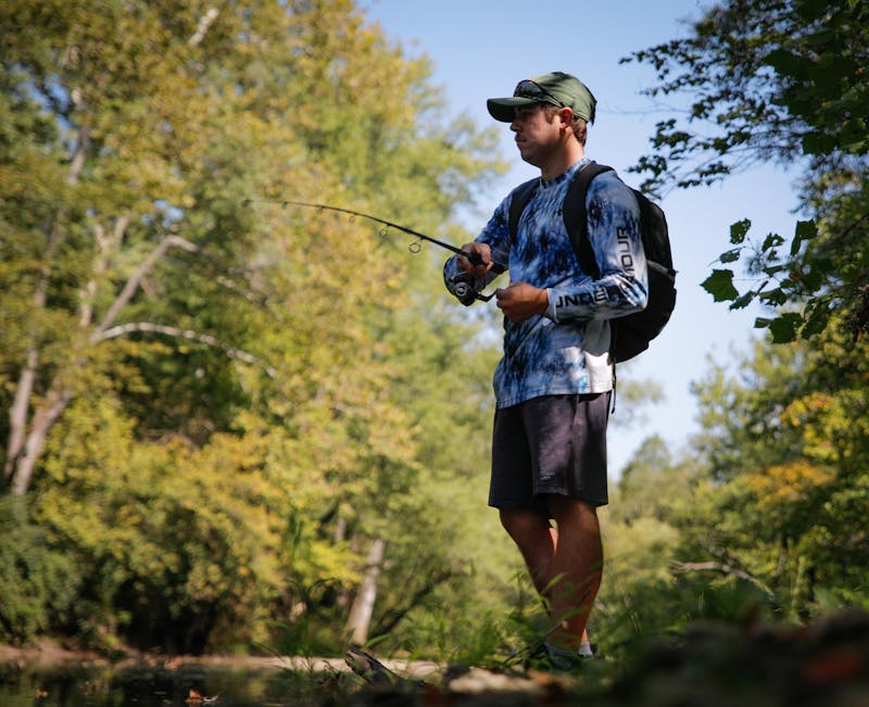 Zach Carter fishes on the White River Sept. 10 in Muncie, In. Carter began fishing with his grandfather when he was very young. Andrew Berger, DN 
