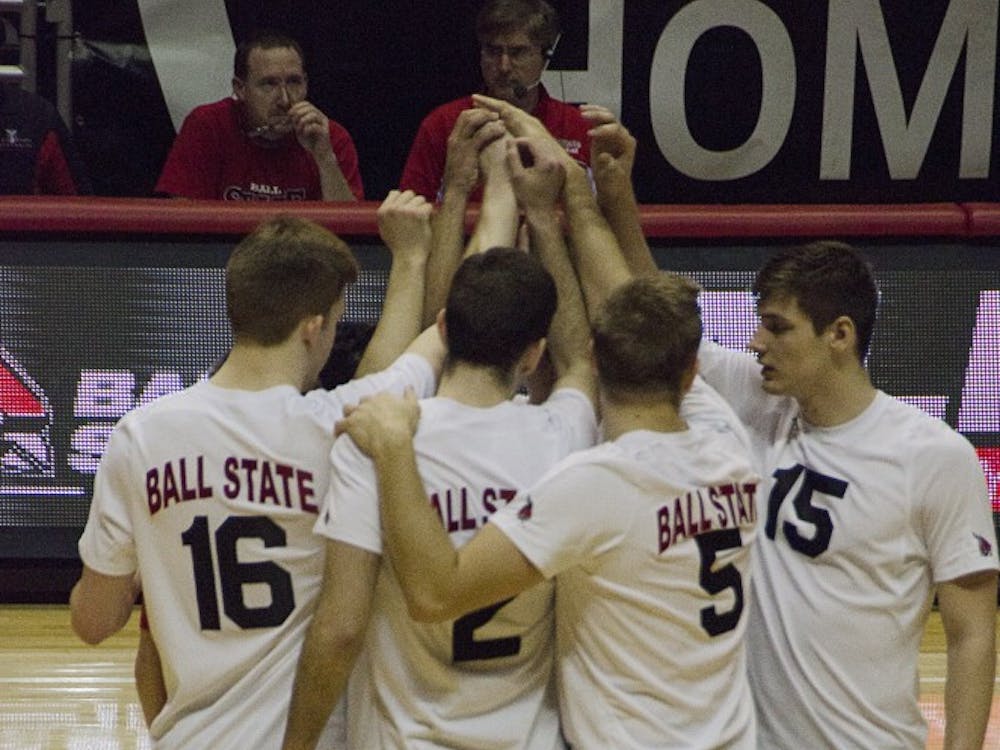 The Ball State men's volleyball team gets in a huddle before a set against Loyola on Feb. 20 at Worthen Arena. DN PHOTO AUDREY ADDINGTON